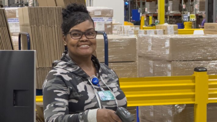 Young woman with hearing disability working at World Wide Technology
